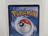 a close up of a pokemon card in a plastic case