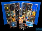 a lot of cd ' s that are in a blue folder