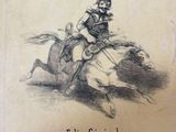 un vieux livre sur lequel figure le dessin d'un homme à cheval