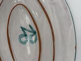 a plate with a number on it on a table