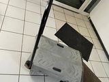 a piece of luggage sitting on the floor in front of a door