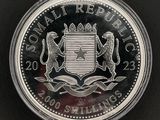 une image représentant une pièce d'argent sur laquelle figure un lion