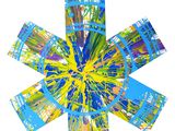 a close up of a flower made out of paper with blue and yellow paint
