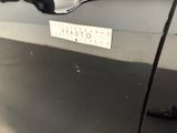 a sticker on the door handle of a car