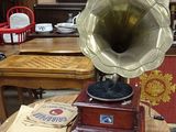 a wooden table with a record player on top of it