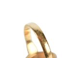 an image of a close up of a gold ring on a white background