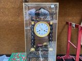 a clock that is sitting on top of a table