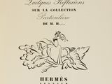 a black and white image of a book with a bird on it