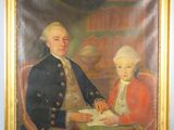 tableau représentant un homme et un enfant assis à une table