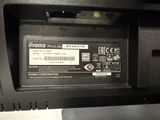 a close up of a black printer with a label on it