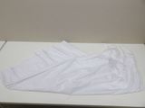 a piece of white paper on a white table