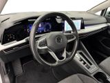 the interior of a car with a steering wheel, dashboard, and display screen