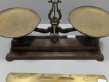 a scale that is sitting on a table next to other items