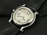 a close up of a watch on a black cloth
