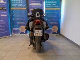 a motorcycle that is parked in a showroom