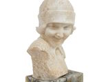 marble bust of a woman with a hat on top of a marble block