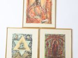 three framed pictures of a woman sitting on a chair in front of a white wall