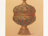an old picture of a vase with a crown on top of it