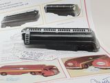 a picture of a toy train set on a sheet of paper