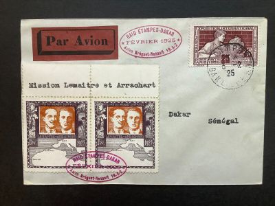 an envelope with two stamps and a stamp with a picture of two men on it