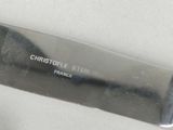 a knife that is sitting on top of a table