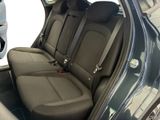 the back seats of a car with a seat belt in the back of it