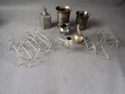 a lot of silver items that are on a table