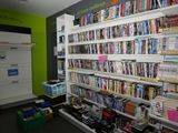 many books on the shelves in the room