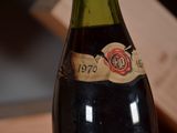 a bottle of wine that is sitting on a table