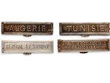 four different types of metal nameplates on a white background