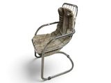 a chair that is sitting on a white surface