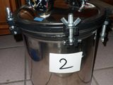 une image représentant un récipient en verre sur lequel figure une horloge