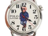 a close up of a watch with a polo bear on it