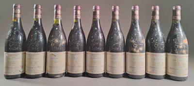 six bottles of wine are lined up in a row on a table