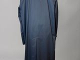 a dark blue coat on a mannequin mannequin mannequin mannequin mannequin mannequin mannequin mannequin manne