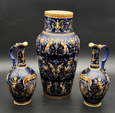 three vases that are sitting next to each other on a table