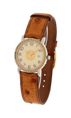 an image of a wrist watch with a brown leather band