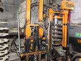 an image of a machine that is working on a piece of machinery