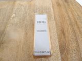 a bottle of dior shower sitting on a table