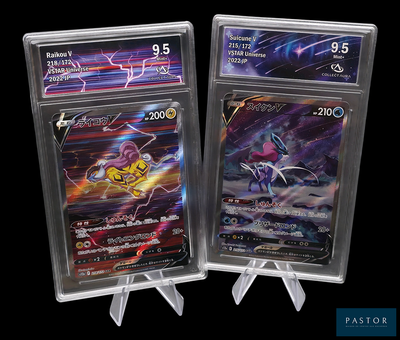 two pokemon trading cards in plastic holders on a black background