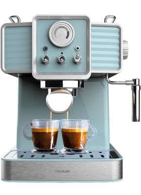 une image représentant une machine à café bleue avec deux tasses de café