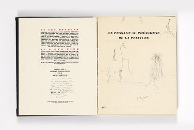 un livre ouvert avec le dessin d'un homme et d'une femme