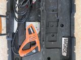 a tool in the case that is sitting on the floor