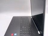 a laptop computer that is sitting on a table