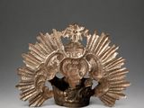 an image of a statue of a man with a crown on top of his head