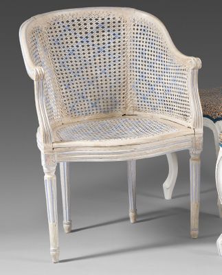 pair of white cane chairs and a stool in the style of louis ii