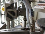 a picture of a machine that has a hose attached to it