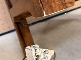 a small piece of wood on top of a wooden table