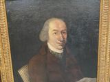painting of a man in a brown coat holding a book