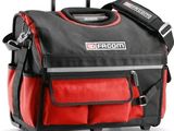 une image représentant un sac à outils rouge et noir muni d'une poignée